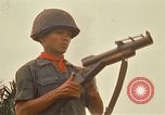 Image of RF-PF forces with M-60 machine gun and M-79 Grenade Launcher Vietnam, 1970, second 44 stock footage video 65675032682
