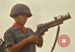 Image of RF-PF forces with M-60 machine gun and M-79 Grenade Launcher Vietnam, 1970, second 45 stock footage video 65675032682