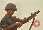 Image of RF-PF forces with M-60 machine gun and M-79 Grenade Launcher Vietnam, 1970, second 47 stock footage video 65675032682