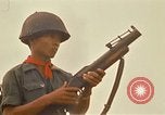 Image of RF-PF forces with M-60 machine gun and M-79 Grenade Launcher Vietnam, 1970, second 48 stock footage video 65675032682