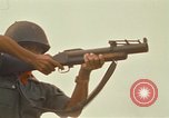 Image of RF-PF forces with M-60 machine gun and M-79 Grenade Launcher Vietnam, 1970, second 50 stock footage video 65675032682
