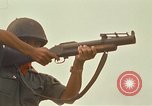 Image of RF-PF forces with M-60 machine gun and M-79 Grenade Launcher Vietnam, 1970, second 51 stock footage video 65675032682