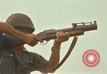 Image of RF-PF forces with M-60 machine gun and M-79 Grenade Launcher Vietnam, 1970, second 54 stock footage video 65675032682