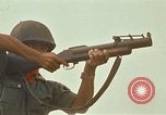Image of RF-PF forces with M-60 machine gun and M-79 Grenade Launcher Vietnam, 1970, second 56 stock footage video 65675032682