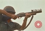 Image of RF-PF forces with M-60 machine gun and M-79 Grenade Launcher Vietnam, 1970, second 57 stock footage video 65675032682