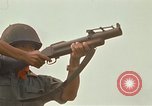 Image of RF-PF forces with M-60 machine gun and M-79 Grenade Launcher Vietnam, 1970, second 58 stock footage video 65675032682