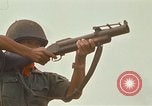 Image of RF-PF forces with M-60 machine gun and M-79 Grenade Launcher Vietnam, 1970, second 59 stock footage video 65675032682