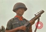 Image of RF-PF forces with M-60 machine gun and M-79 Grenade Launcher Vietnam, 1970, second 60 stock footage video 65675032682