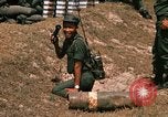 Image of Vietnamese Forces engaged in live fire mock combat Vietnam, 1970, second 60 stock footage video 65675032684