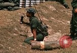 Image of Vietnamese Forces engaged in live fire mock combat Vietnam, 1970, second 62 stock footage video 65675032684