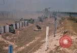 Image of Vietnamese forces firing M-16s in live fire exercise Vietnam, 1970, second 18 stock footage video 65675032685