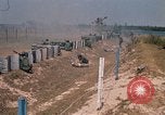 Image of Vietnamese forces firing M-16s in live fire exercise Vietnam, 1970, second 19 stock footage video 65675032685