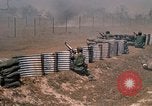 Image of Vietnamese forces firing M-16s in live fire exercise Vietnam, 1970, second 51 stock footage video 65675032685