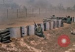 Image of Vietnamese forces firing M-16s in live fire exercise Vietnam, 1970, second 52 stock footage video 65675032685