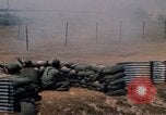 Image of Vietnamese forces firing M-16s in live fire exercise Vietnam, 1970, second 54 stock footage video 65675032685