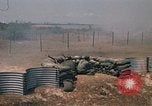Image of Vietnamese forces firing M-16s in live fire exercise Vietnam, 1970, second 56 stock footage video 65675032685