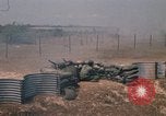 Image of Vietnamese forces firing M-16s in live fire exercise Vietnam, 1970, second 57 stock footage video 65675032685
