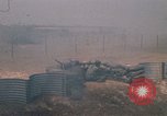 Image of Vietnamese forces firing M-16s in live fire exercise Vietnam, 1970, second 58 stock footage video 65675032685