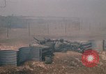 Image of Vietnamese forces firing M-16s in live fire exercise Vietnam, 1970, second 60 stock footage video 65675032685
