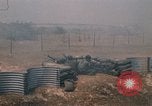 Image of Vietnamese forces firing M-16s in live fire exercise Vietnam, 1970, second 61 stock footage video 65675032685
