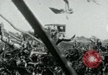 Image of Viet Cong watching U.S. soldiers in Jeep Vietnam, 1965, second 7 stock footage video 65675032686