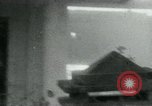 Image of Viet Cong watching U.S. soldiers in Jeep Vietnam, 1965, second 23 stock footage video 65675032686
