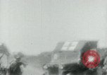 Image of Viet Cong watching U.S. soldiers in Jeep Vietnam, 1965, second 26 stock footage video 65675032686