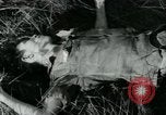 Image of Viet Cong watching U.S. soldiers in Jeep Vietnam, 1965, second 29 stock footage video 65675032686