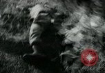 Image of Viet Cong watching U.S. soldiers in Jeep Vietnam, 1965, second 31 stock footage video 65675032686