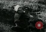Image of Viet Cong watching U.S. soldiers in Jeep Vietnam, 1965, second 32 stock footage video 65675032686