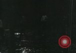 Image of Vietnamese people leaving a damaged Viet Cong camp Vietnam, 1965, second 11 stock footage video 65675032689