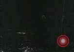 Image of Vietnamese people leaving a damaged Viet Cong camp Vietnam, 1965, second 12 stock footage video 65675032689