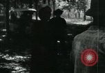 Image of Vietnamese people leaving a damaged Viet Cong camp Vietnam, 1965, second 17 stock footage video 65675032689
