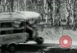 Image of Vietnamese people leaving a damaged Viet Cong camp Vietnam, 1965, second 20 stock footage video 65675032689