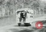 Image of Vietnamese people leaving a damaged Viet Cong camp Vietnam, 1965, second 29 stock footage video 65675032689