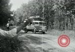 Image of Vietnamese people leaving a damaged Viet Cong camp Vietnam, 1965, second 33 stock footage video 65675032689
