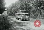 Image of Vietnamese people leaving a damaged Viet Cong camp Vietnam, 1965, second 34 stock footage video 65675032689