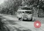 Image of Vietnamese people leaving a damaged Viet Cong camp Vietnam, 1965, second 37 stock footage video 65675032689