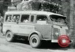 Image of Vietnamese people leaving a damaged Viet Cong camp Vietnam, 1965, second 41 stock footage video 65675032689