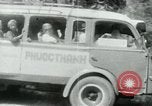 Image of Vietnamese people leaving a damaged Viet Cong camp Vietnam, 1965, second 43 stock footage video 65675032689