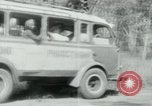Image of Vietnamese people leaving a damaged Viet Cong camp Vietnam, 1965, second 45 stock footage video 65675032689