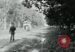 Image of Vietnamese people leaving a damaged Viet Cong camp Vietnam, 1965, second 51 stock footage video 65675032689