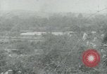 Immagine di Il Viet Cong impostazione di mitragliatrice e immettendo le gallerie nella giungla Il Vietnam, 1965, secondo 24 filmato di repertorio 65675032691