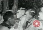 Immagine di Il Viet Cong incontro politico alla base nella giungla Il Vietnam, 1965, secondo 10 filmato di repertorio 65675032693