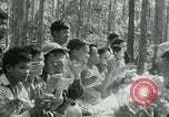 Immagine di Il Viet Cong incontro politico alla base nella giungla Il Vietnam, 1965, secondo 29 filmato di repertorio 65675032693