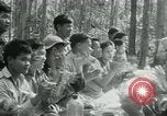 Immagine di Il Viet Cong incontro politico alla base nella giungla Il Vietnam, 1965, secondo 30 filmato di repertorio 65675032693