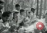 Immagine di Il Viet Cong incontro politico alla base nella giungla Il Vietnam, 1965, secondo 31 filmato di repertorio 65675032693