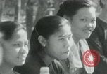 Immagine di Il Viet Cong incontro politico alla base nella giungla Il Vietnam, 1965, secondo 35 filmato di repertorio 65675032693