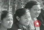 Immagine di Il Viet Cong incontro politico alla base nella giungla Il Vietnam, 1965, secondo 36 filmato di repertorio 65675032693