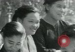 Immagine di Il Viet Cong incontro politico alla base nella giungla Il Vietnam, 1965, secondo 39 filmato di repertorio 65675032693